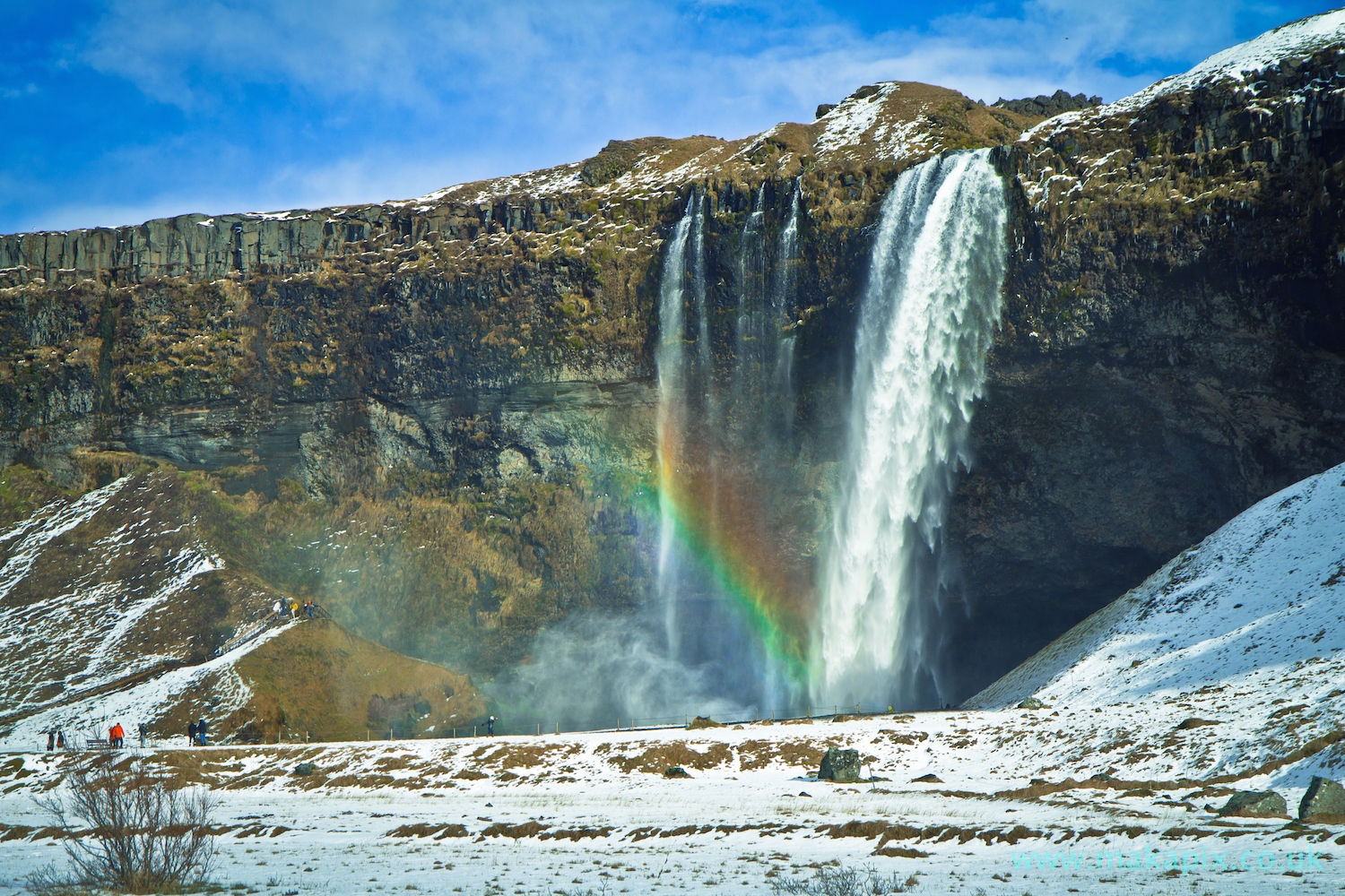 Winter, Rainbow and snow Seljalandsfoss Waterfalls