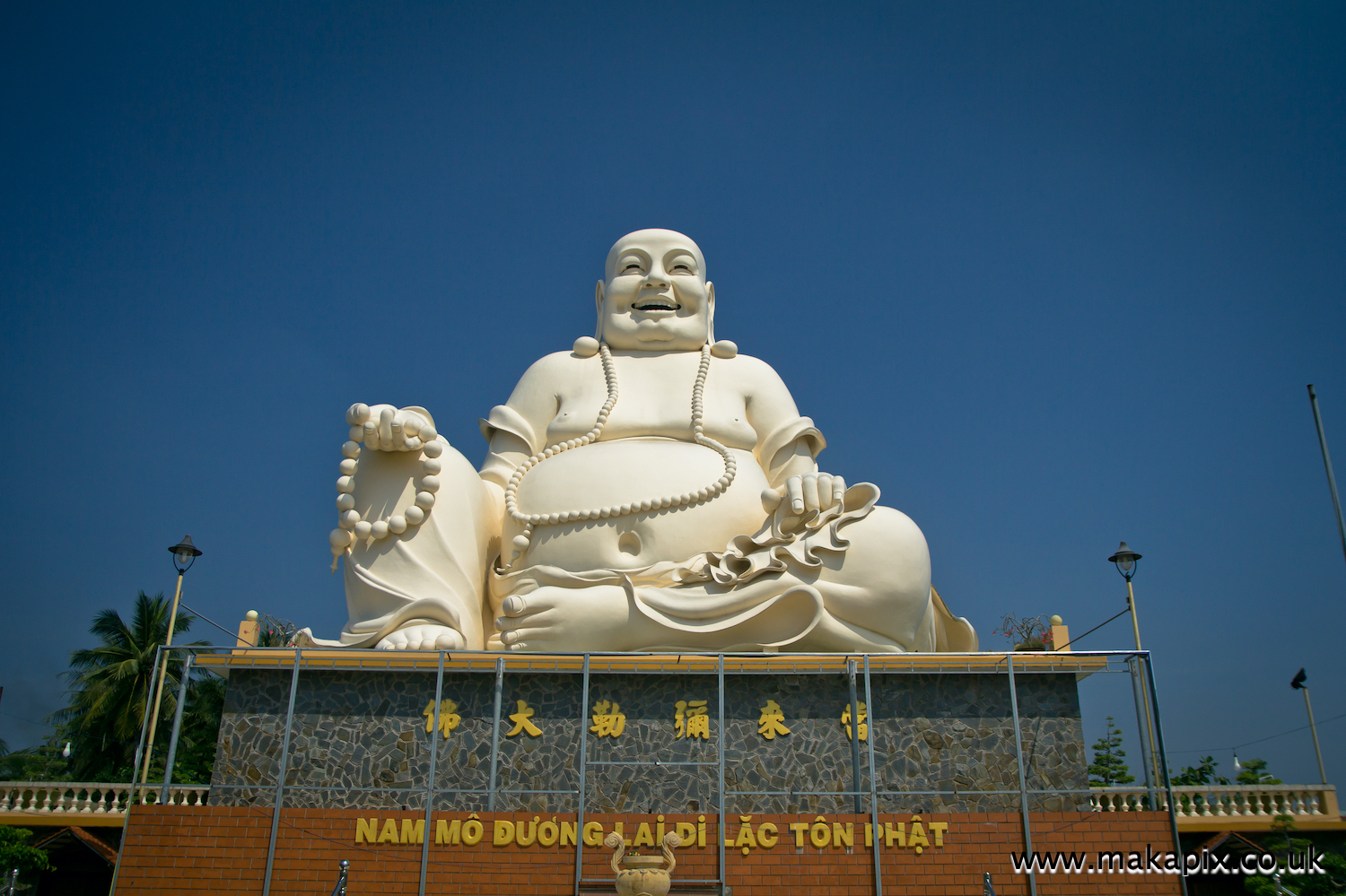 Statue of Budai, Vinh Trang temple, Vietnam